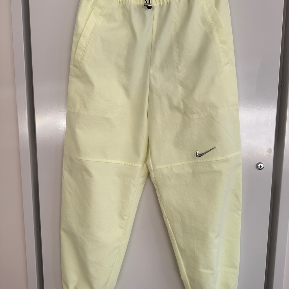 Women’s Nike Woven Light Yellow Joggers